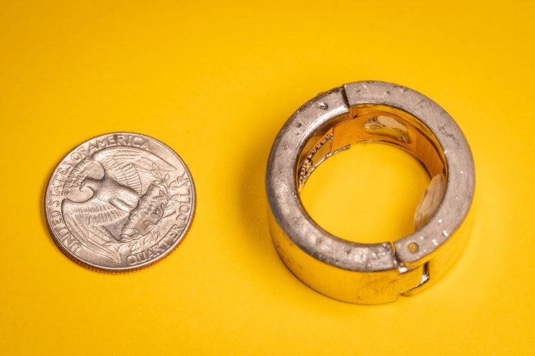 Biomarker Ring Next to Quarter